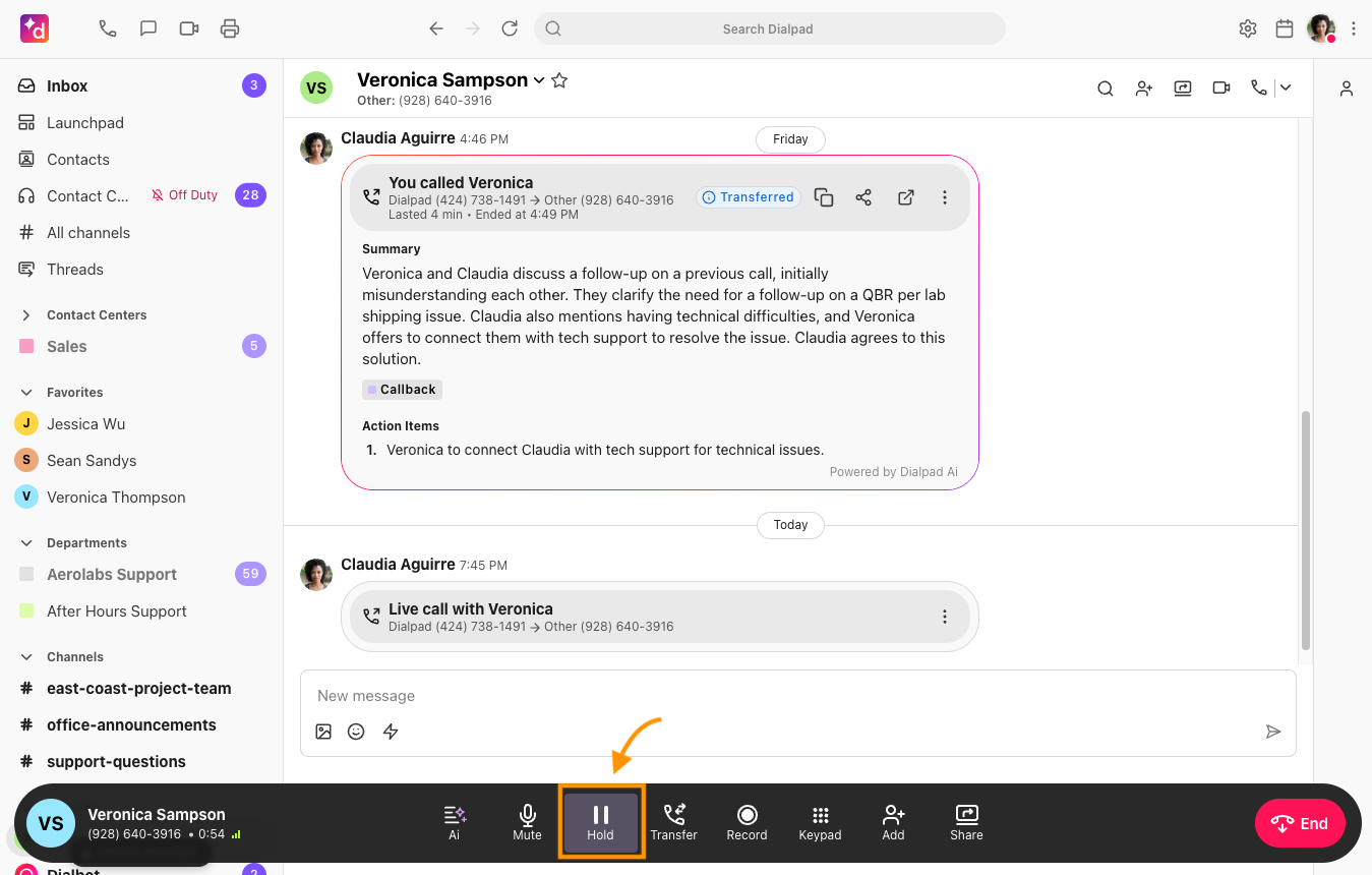 Screenshot of an active call in Dialpad, with an orange arrow and box highlighting the Hold button on the bottom call bar.