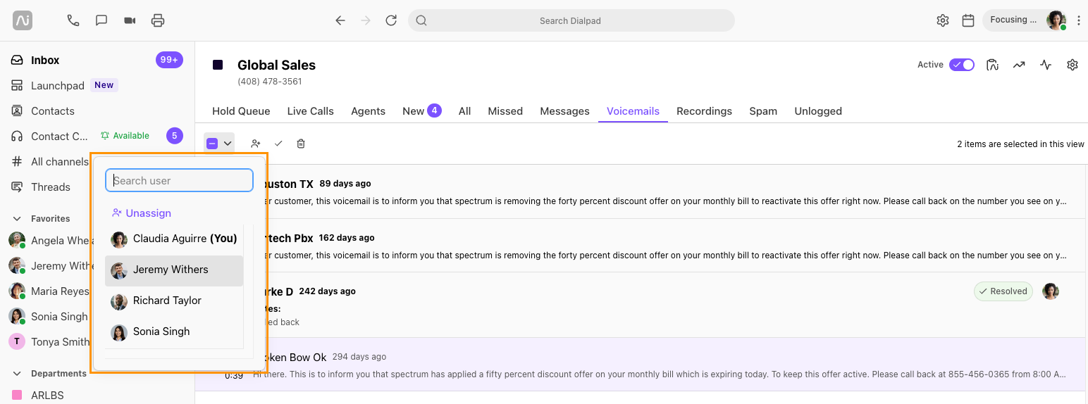 Screenshot of Dialpad showing an opened assignee dropdown menu with an orange box highlighting the agent search field and list of available users.