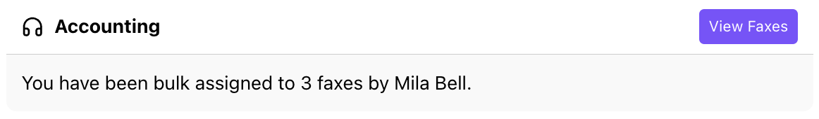 Screenshot of a Dialbot notification message stating that a user has been bulk assigned to multiple faxes, with a purple 'View Faxes' action button.