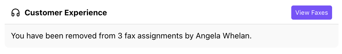Screenshot of a Dialbot notification message stating that a user has been removed from multiple fax assignments, with a purple 'View Faxes' action button.