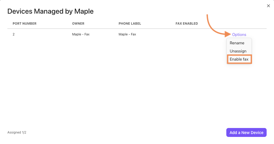Screenshot of a modal window showing a table of managed devices, featuring an orange arrow pointing to an open Options menu with 'Enable fax' highlighted in an orange box.