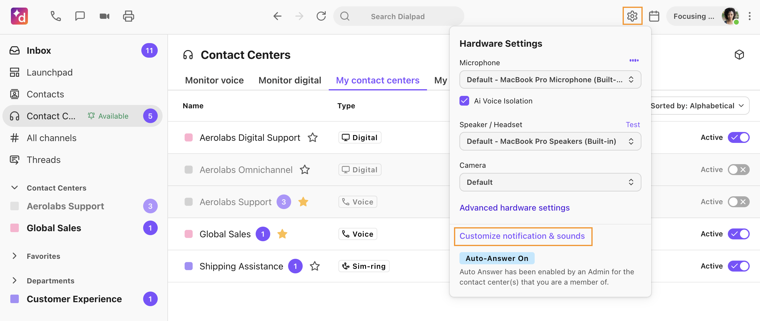 Screenshot of the Dialpad desktop app showing the Hardware Settings dropdown menu, with orange boxes highlighting the gear settings icon in the top header and the 'Customize notification & sounds' option at the bottom.