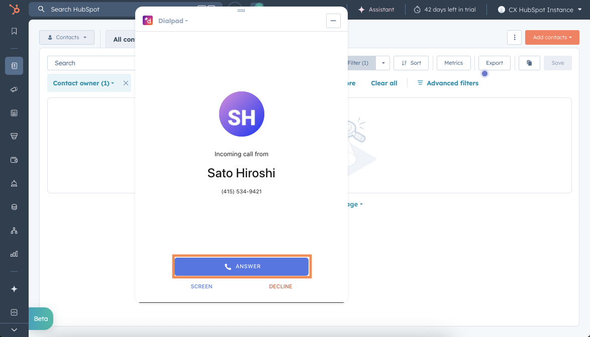 Screenshot of an incoming call notification from Sato Hiroshi in the embedded Dialpad widget within HubSpot, featuring an orange box highlighting the blue 'ANSWER' button.