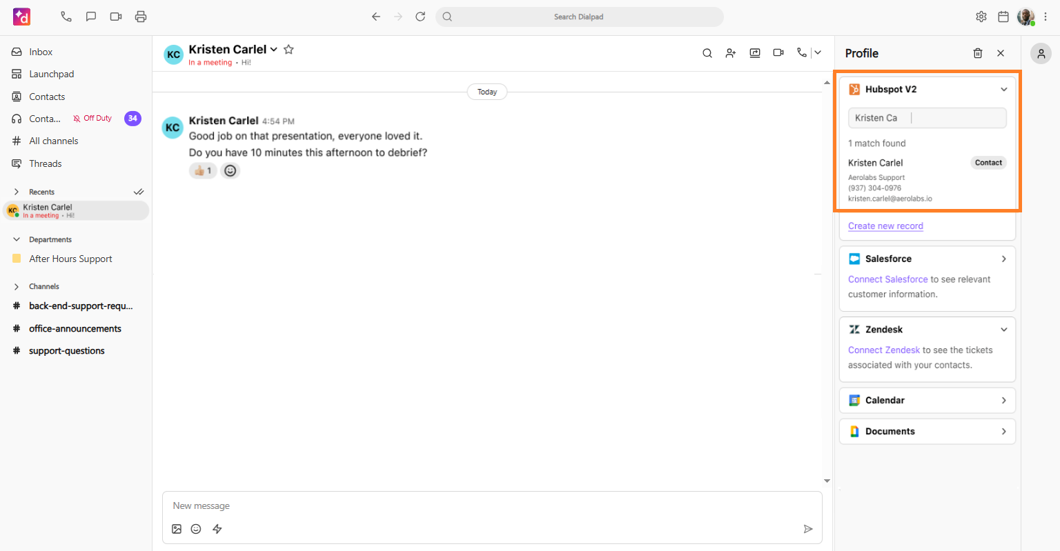 Screenshot of the Dialpad desktop app featuring an orange box on the right sidebar highlighting the Hubspot V2 search bar and matching contact result.