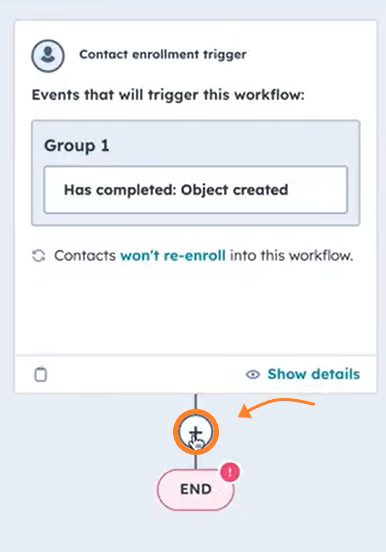 Screenshot of a HubSpot Contact enrollment trigger workflow block, featuring an orange circle and arrow highlighting the plus (+) icon used to add a workflow action below the trigger.