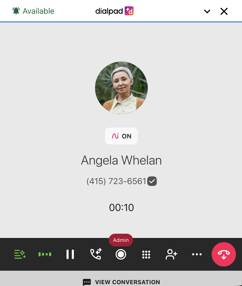Screenshot of an active call in the Dialpad CTI widget displaying lower control bar icons for call features like mute, hold, transfer, record, and end call.
