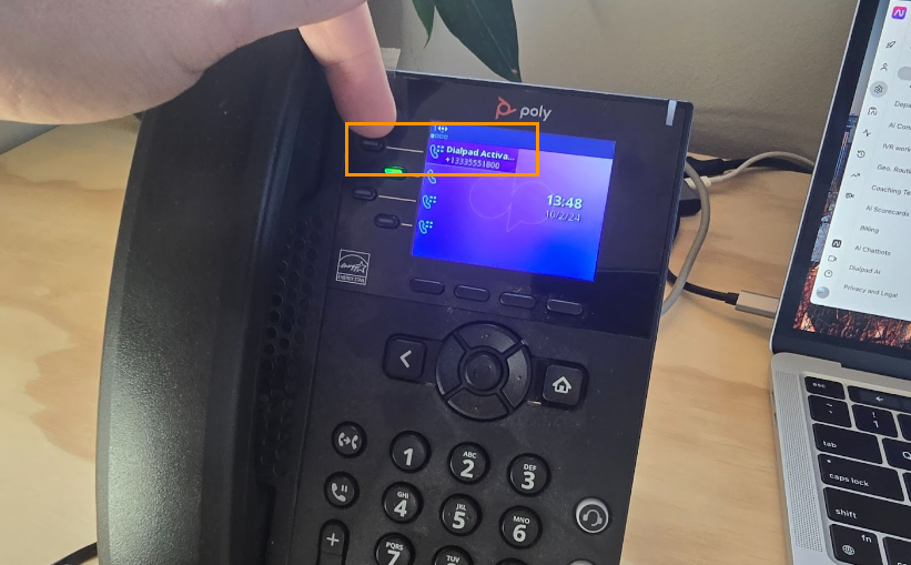 Line key on a desk showing dialpad activate