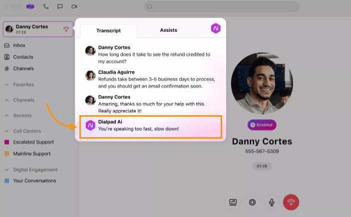 Active call interface displaying an on-screen speech coaching notification with a warning prompt advising the agent to slow down their speaking pace.